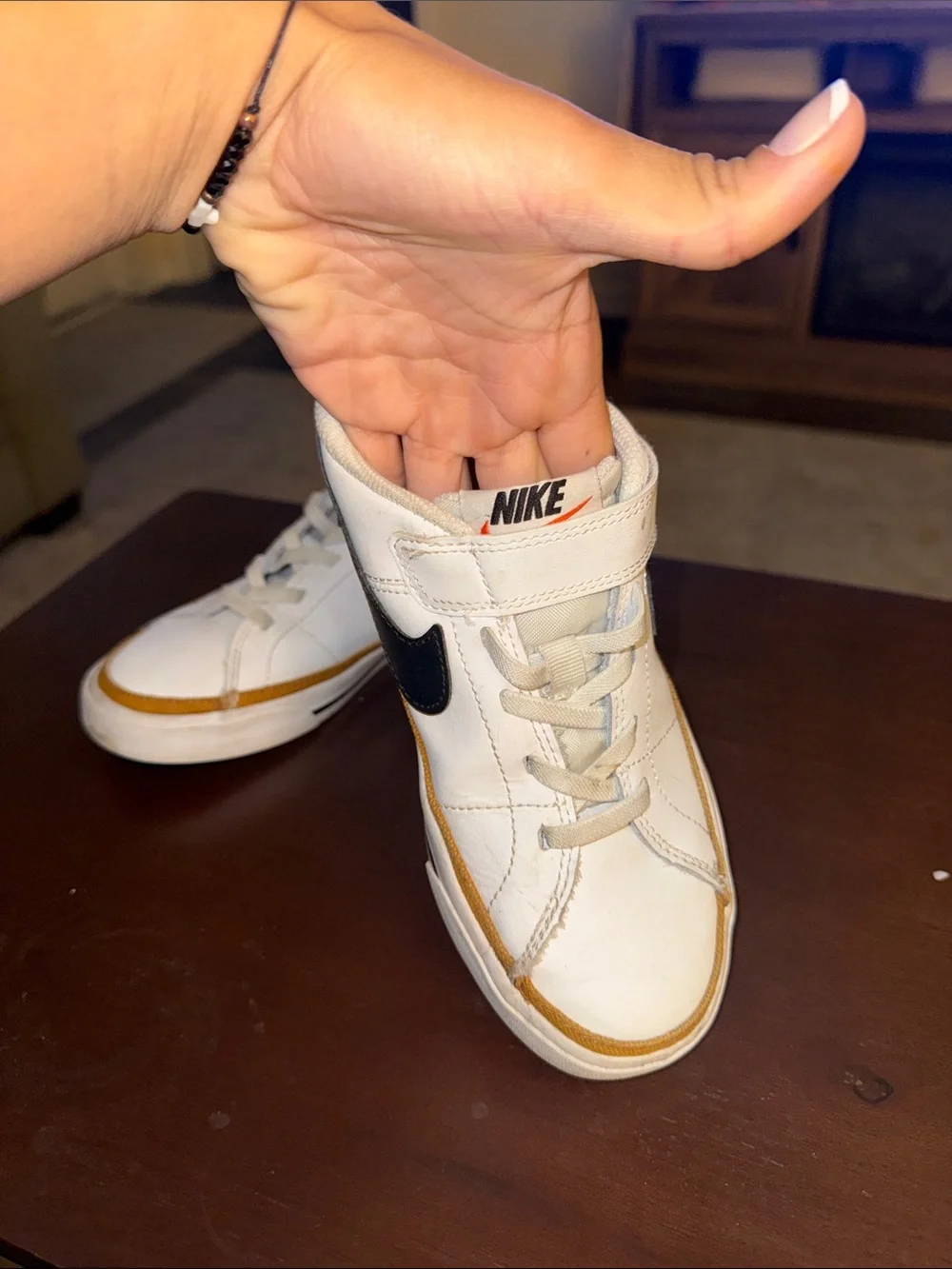 Nike White Sneakers with Black Swoosh and Tan Trim